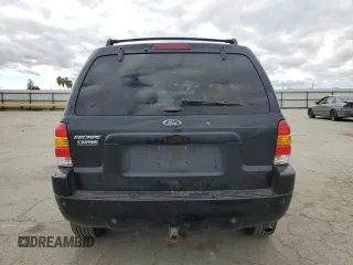 2004 Ford Escape Limited with VIN 1FMCU04134KA61949, listed as a Copart auction lot 47377455 with 205,480 mi miles and Salvage title. Bid and sale history available at DreamBid. Image 6.