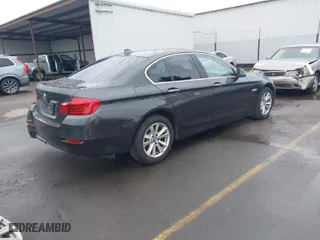 2014 BMW 5 Series 528i with VIN WBA5A5C5XED512448, listed as a IAAI auction lot 41559871 with 145,383 mi miles. Bid and sale history available at carsss.com. Image 4.
