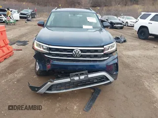 2023 Volkswagen Atlas SE z VIN 1V2KR2CA8PC504298, wystawiony jako IAAI lot #41234957 z przebiegiem 34 762 mil mil oraz . Historia ofert i sprzedaży dostępna na DreamBid. Obrazek 6.