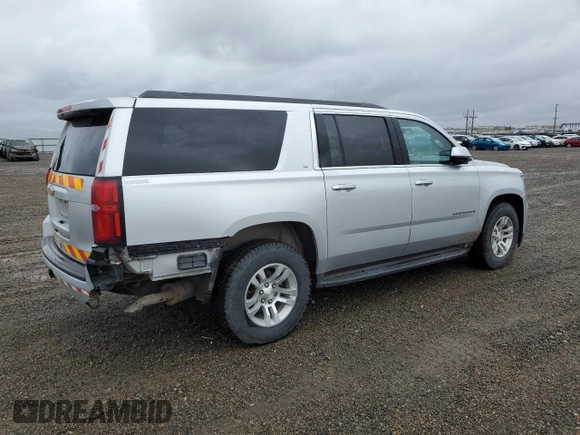 2019 Chevrolet Suburban LT z VIN 1GNSKHKC0KR397479, wystawiony jako Copart lot #56206065 z przebiegiem 289 466 mil mil oraz Czysty tytuł • Clean title. Historia ofert i sprzedaży dostępna na DreamBid. Obrazek 3.