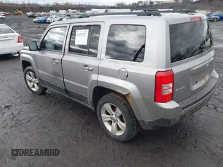 2014 Jeep Patriot Latitude with VIN 1C4NJRFB6ED778433, listed as a IAAI auction lot 41211522 with 127,506 mi miles. Bid and sale history available at carsss.com. Image 3.