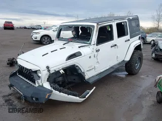 2015 Jeep Wrangler Unlimited Sahara with VIN 1C4BJWEG5FL518191, listed as a IAAI auction lot 41914581 with 107,433 mi miles. Bid and sale history available at carsss.com. Image 2.
