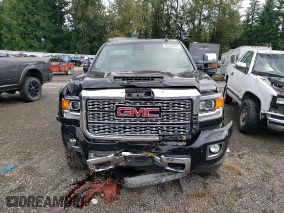 2018 GMC Sierra 3500HD Denali z VIN 1GT42YEY6JF290445, wystawiony jako Copart lot #69260864 z przebiegiem 46 963 mil mil oraz Szkody całkowita. Historia ofert i sprzedaży dostępna na DreamBid. Obrazek 5.