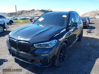 2019 BMW X5 xDrive50i with VIN 5UXJU2C5XKLN66873, listed as a IAAI auction lot 41472246 with 98,571 mi miles. Bid and sale history available at carsss.com. Image 18.