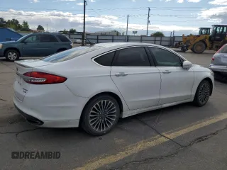 2018 Ford Fusion Titanium with VIN 3FA6P0D94JR247057, listed as a Copart auction lot 56916365 with 101,577 mi miles and Salvage title. Bid and sale history available at DreamBid. Image 3.