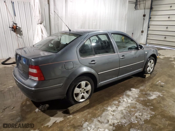 2004 Volkswagen Jetta Sedan GLS with VIN 3VWSK69M24M017121, listed as a Copart auction lot 86994314 with 114,985 mi miles and Salvage Title. Bid and sale history available at carsss.com. Image 3.