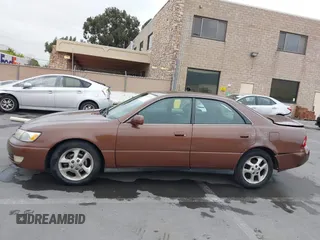 2001 Lexus ES 300 with VIN JT8BF28G310340604, listed as a IAAI auction lot 42113774 with 260,303 mi miles and . Bid and sale history available at DreamBid. Image 14.