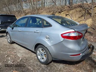 2016 Ford Fiesta SE with VIN 3FADP4BJ4GM106538, listed as a IAAI auction lot 41871345 with 123,847 mi miles. Bid and sale history available at carsss.com. Image 3.