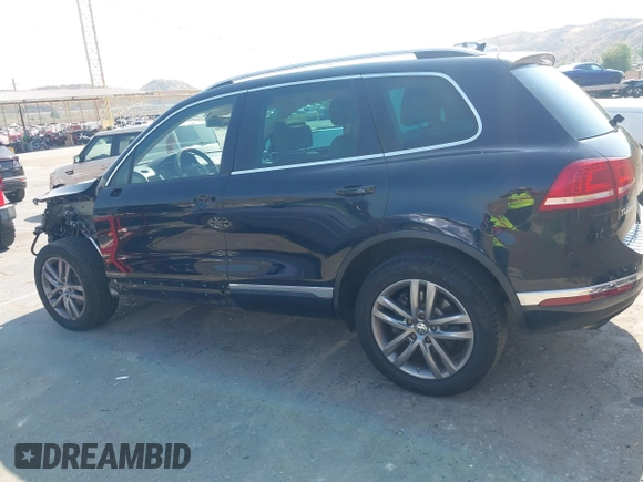 2016 Volkswagen Touareg Sport with VIN WVGEF9BP7GD010252, listed as a IAAI auction lot 42465165 with Not provided miles and . Bid and sale history available at DreamBid. Image 15.