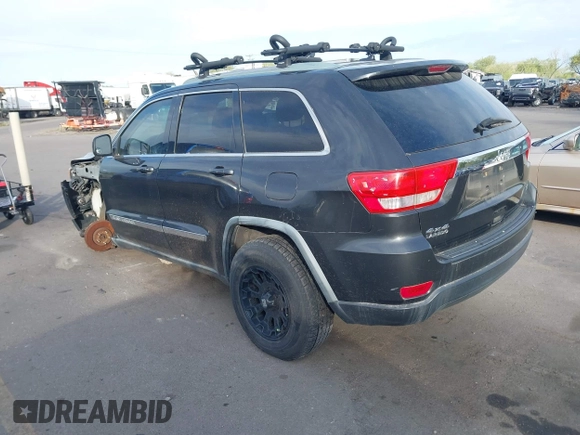 2011 Jeep Grand Cherokee 70th Anniversary with VIN 1J4RR4GG1BC588848, listed as a IAAI auction lot 42117042 with 168,273 mi miles. Bid and sale history available at carsss.com. Image 3.