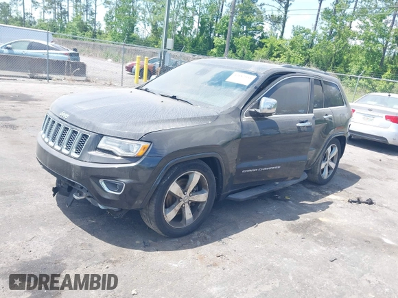 2015 Jeep Grand Cherokee Overland with VIN 1C4RJFCT9FC859740, listed as a IAAI auction lot 42187933 with 231,481 mi miles. Bid and sale history available at carsss.com. Image 2.