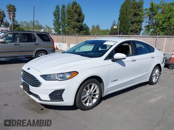 2019 Ford Fusion Hybrid SE with VIN 3FA6P0LU9KR207824, listed as a IAAI auction lot 42153330 with 69,966 mi miles. Bid and sale history available at carsss.com. Image 6.