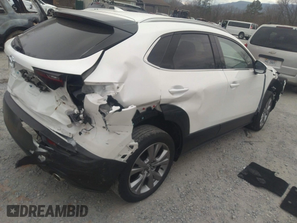 2021 Mazda CX-30 Premium with VIN 3MVDMADL5MM318729, listed as a IAAI auction lot 41645560 with 51,132 mi miles and . Bid and sale history available at DreamBid. Image 4.