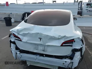 2018 Tesla Model 3 Long Range Battery with VIN 5YJ3E1EA3JF023300, listed as a IAAI auction lot 41925504 with 100,512 mi miles and . Bid and sale history available at DreamBid. Image 17.