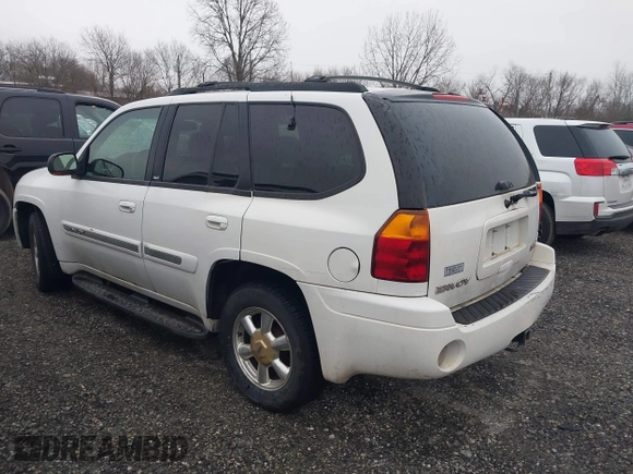 2003 GMC Envoy SLE with VIN 1GKDT13S732332171, listed as a IAAI auction lot 41520620 with 222,373 mi miles. Bid and sale history available at carsss.com. Image 3.