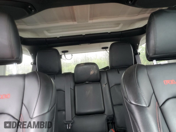 2023 Jeep Wrangler Rubicon with VIN 1C4JJXFM4PW589923, listed as a Copart auction lot 58725465 with 9,814 mi miles and Salvage title. Bid and sale history available at DreamBid. Image 10.