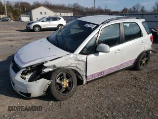 2012 Suzuki SX4 Crossover with VIN JS2YB5A32C6303887, listed as a Copart auction lot 82214144 with 0 mi miles and Salvage Title. Bid and sale history available at carsss.com. Image 1.