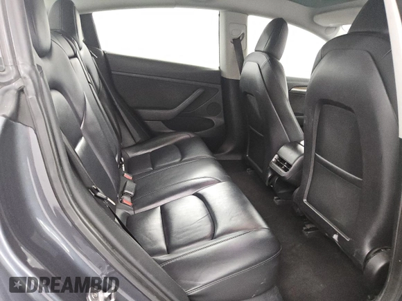 2023 Tesla Model 3 z VIN 5YJ3E1EA3PF459640, wystawiony jako Copart lot #61107195 z przebiegiem 141 027 mil mil oraz Czysty tytuł • Clean title. Historia ofert i sprzedaży dostępna na DreamBid. Obrazek 10.