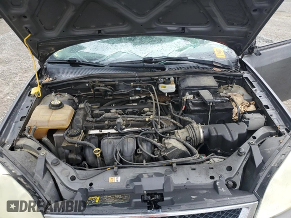 2007 Ford Focus S с VIN 1FAFP34NX7W317259, выставлен на аукционе Copart как лот 52158405 с пробегом 206 602 миль миль и Списание • Salvage title. История ставок и продаж доступна на DreamBid. Изображение 12.