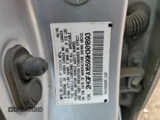 2009 Honda Civic LX z VIN 2HGFA16599H301893, wystawiony jako Copart lot #58815225 z przebiegiem 174 952 mil mil oraz Szkoda całkowita • Salvage title. Historia ofert i sprzedaży dostępna na DreamBid. Obrazek 13.