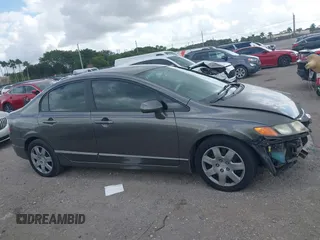 2009 Honda Civic LX z VIN 2HGFA16599H369479, wystawiony jako IAAI lot #41489267 z przebiegiem 143 297 mil mil oraz . Historia ofert i sprzedaży dostępna na DreamBid. Obrazek 13.
