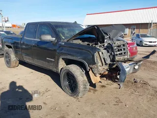 2015 GMC Sierra 1500 SLE with VIN 1GTV2UEC2FZ205267, listed as a IAAI auction lot 41593807 with 194,921 mi miles. Bid and sale history available at carsss.com. Image 1.