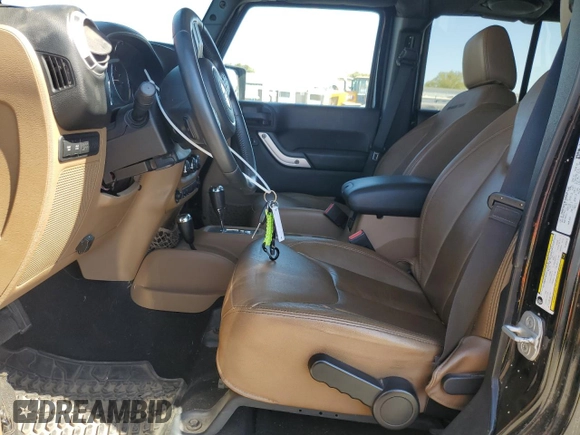 2013 Jeep Wrangler Unlimited Rubicon 10th Anniversary with VIN 1C4HJWFG4DL550832, listed as a Copart auction lot 71633684 with 60,759 mi miles and Salvage title. Bid and sale history available at DreamBid. Image 7.