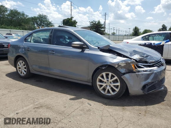 2013 Volkswagen Jetta SE with VIN 3VWDP7AJ8DM449097, listed as a Copart auction lot 62155135 with 130,266 mi miles and Salvage title. Bid and sale history available at DreamBid. Image 4.