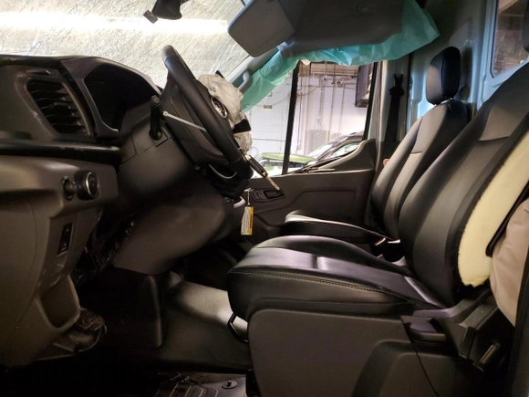 2024 Ford Transit Cargo with VIN 1FTBR1X86RKA81698, listed as a Copart auction lot 42611405 with 13,736 mi miles and Clean Title. Bid and sale history available at carsss.com. Image 7.