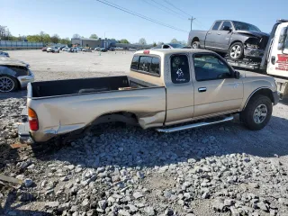1999 Toyota Tacoma z VIN 4TAWN72N5XZ418522, wystawiony jako Copart lot #51940615 z przebiegiem 340 432 mil mil oraz Szkoda całkowita • Salvage title. Historia ofert i sprzedaży dostępna na DreamBid. Obrazek 3.
