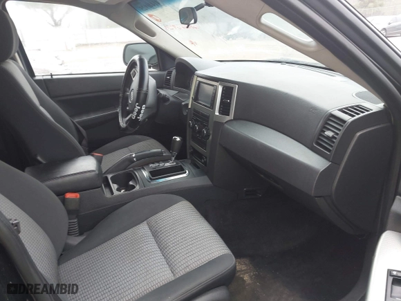 2009 Jeep Grand Cherokee Laredo with VIN 1J8GS48K39C549136, listed as a IAAI auction lot 41446925 with 162,639 mi miles. Bid and sale history available at carsss.com. Image 5.