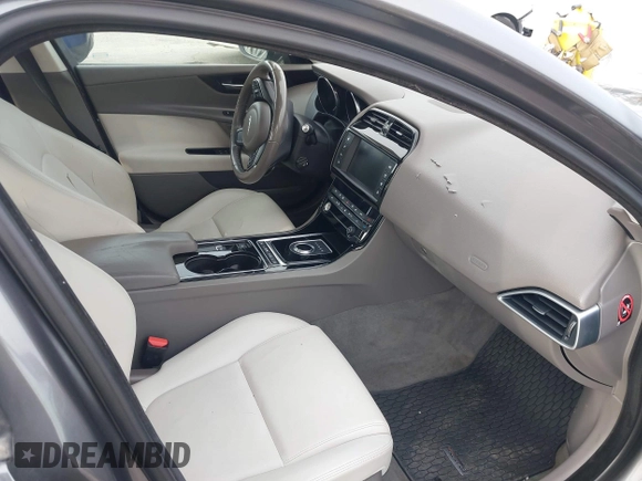 2017 Jaguar XE 25t Premium with VIN SAJAD4BG0HA975017, listed as a IAAI auction lot 41589536 with 40,136 mi miles. Bid and sale history available at carsss.com. Image 5.