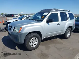 2012 Nissan Xterra X with VIN 5N1AN0NWXCC521017, listed as a IAAI auction lot 42136539 with 163,515 mi miles. Bid and sale history available at carsss.com. Image 2.