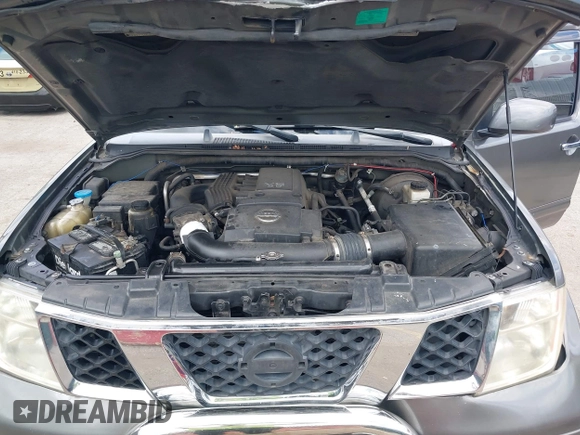 2005 Nissan Pathfinder SE z VIN 5N1AR18W25C701343, wystawiony jako IAAI lot #42209613 z przebiegiem 231 149 mil mil oraz . Historia ofert i sprzedaży dostępna na DreamBid. Obrazek 10.