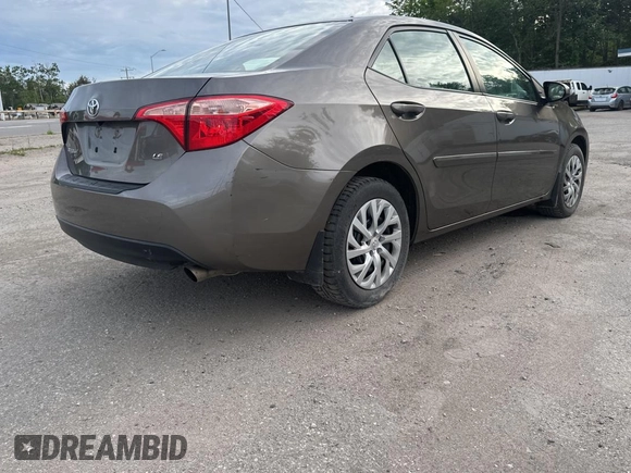 2019 Toyota Corolla L z VIN 2T1BURHE5KC220051, wystawiony jako Copart lot #61879415 z przebiegiem 196 200 mil mil oraz Czysty tytuł • Clean title. Historia ofert i sprzedaży dostępna na DreamBid. Obrazek 4.