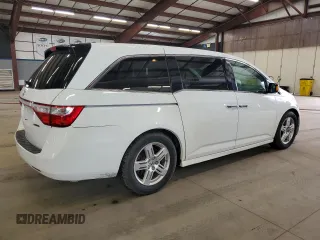 2011 Honda Odyssey Touring Elite with VIN 5FNRL5H90BB083092, listed as a Copart auction lot 54178785 with 135,765 mi miles and Salvage Title. Bid and sale history available at DreamBid. Image 3.