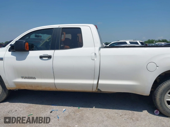 2010 Toyota Tundra SR with VIN 5TFTY5F19AX006696, listed as a IAAI auction lot 42379570 with 332,246 mi miles and . Bid and sale history available at DreamBid. Image 14.