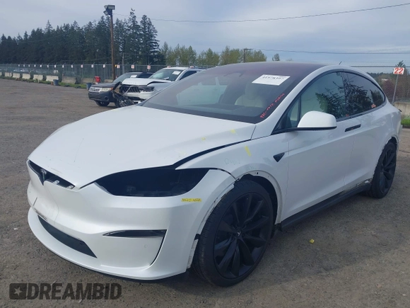 2022 Tesla Model X with VIN 7SAXCBE54NF363113, listed as a IAAI auction lot 41978397 with 27,166 mi miles. Bid and sale history available at carsss.com. Image 6.