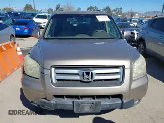 2006 Honda Pilot EX with VIN 5FNYF28416B017534, listed as a IAAI auction lot 41656789 with 241,343 mi miles and . Bid and sale history available at DreamBid. Image 12.