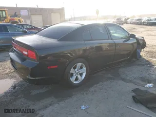 2014 Dodge Charger SE with VIN 2C3CDXBGXEH353860, listed as a IAAI auction lot 41819065 with 158,774 mi miles. Bid and sale history available at carsss.com. Image 4.