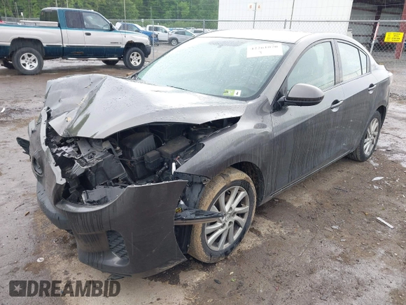 2012 Mazda 3 i Touring with VIN JM1BL1V74C1665655, listed as a IAAI auction lot 42261070 with 102,885 mi miles and . Bid and sale history available at DreamBid. Image 2.