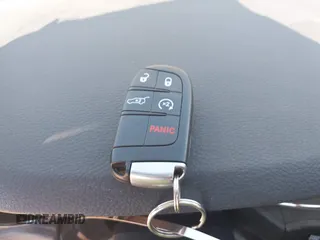 2019 Jeep Grand Cherokee Laredo E with VIN 1C4RJFAG8KC849782, listed as a IAAI auction lot 42151331 with 141,099 mi miles and . Bid and sale history available at DreamBid. Image 11.