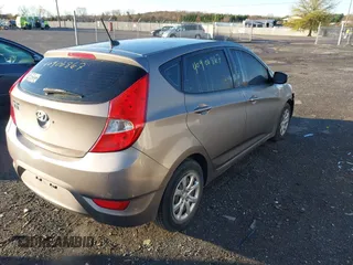 2013 Hyundai Accent GS z VIN KMHCT5AE8DU126970, wystawiony jako IAAI lot #40906867 z przebiegiem 142 484 mil mil oraz . Historia ofert i sprzedaży dostępna na DreamBid. Obrazek 4.