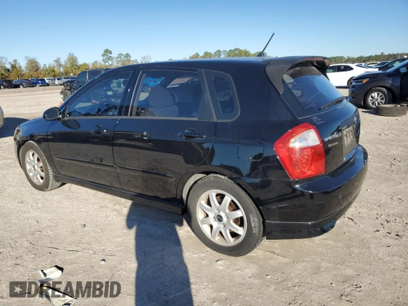 2005 Kia Spectra with VIN KNAFE161355073968, listed as a Copart auction lot 84543784 with 166,858 mi miles and Salvage Title. Bid and sale history available at carsss.com. Image 2.