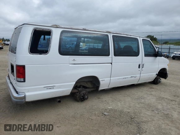 2001 Ford Econoline Passenger XL with VIN 1FBSS31L41HB19352, listed as a Copart auction lot 53101325 with 101,807 mi miles and Salvage title. Bid and sale history available at DreamBid. Image 3.