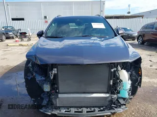 2024 Cadillac XT4 FWD Sport with VIN 1GYFZER40RF226384, listed as a IAAI auction lot 42220804 with 8,743 mi miles and . Bid and sale history available at DreamBid. Image 13.