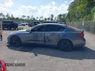 2014 Infiniti Q50 Sport with VIN JN1BV7AP4EM670443, listed as a IAAI auction lot 41801219 with 98,719 mi miles and . Bid and sale history available at DreamBid. Image 14.