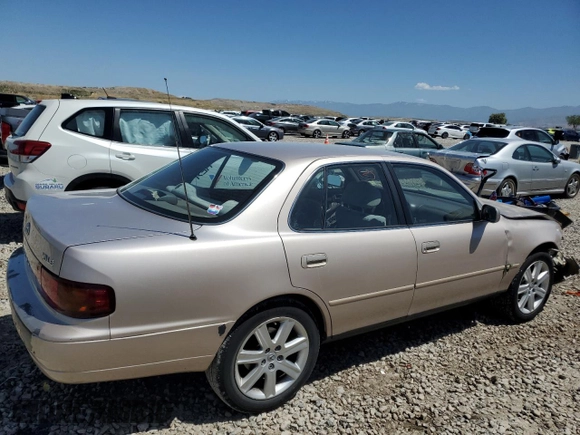 1996 Toyota Camry LE with VIN 4T1BF12K3TU132870, listed as a Copart auction lot 58052975 with 88,210 mi miles and Salvage title. Bid and sale history available at DreamBid. Image 3.