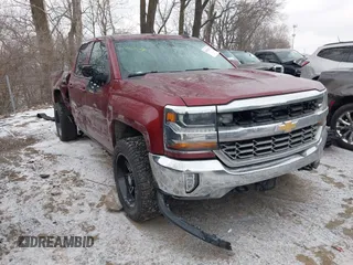 2016 Chevrolet Silverado 1500 LT with VIN 1GCVKRECXGZ339183, listed as a IAAI auction lot 41407017 with 121,373 mi miles. Bid and sale history available at carsss.com. Image 1.