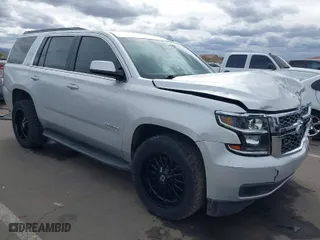 2018 Chevrolet Tahoe LT with VIN 1GNSCBKC2JR115318, listed as a IAAI auction lot 41809253 with 107,217 mi miles. Bid and sale history available at carsss.com. Image 1.
